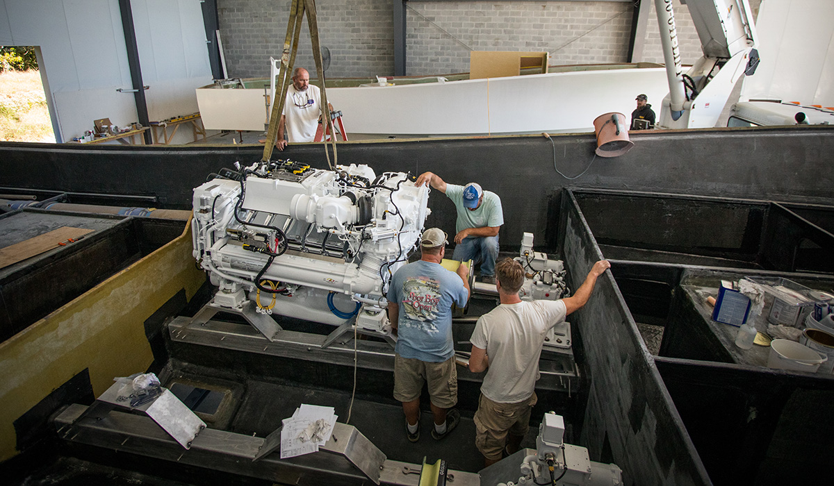 Photo of engine being lowered into boat