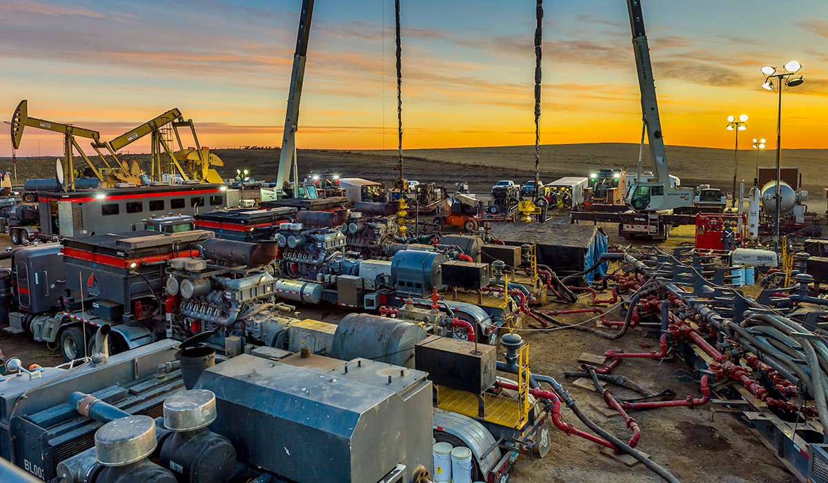 Photo of fracturing site at sunset.