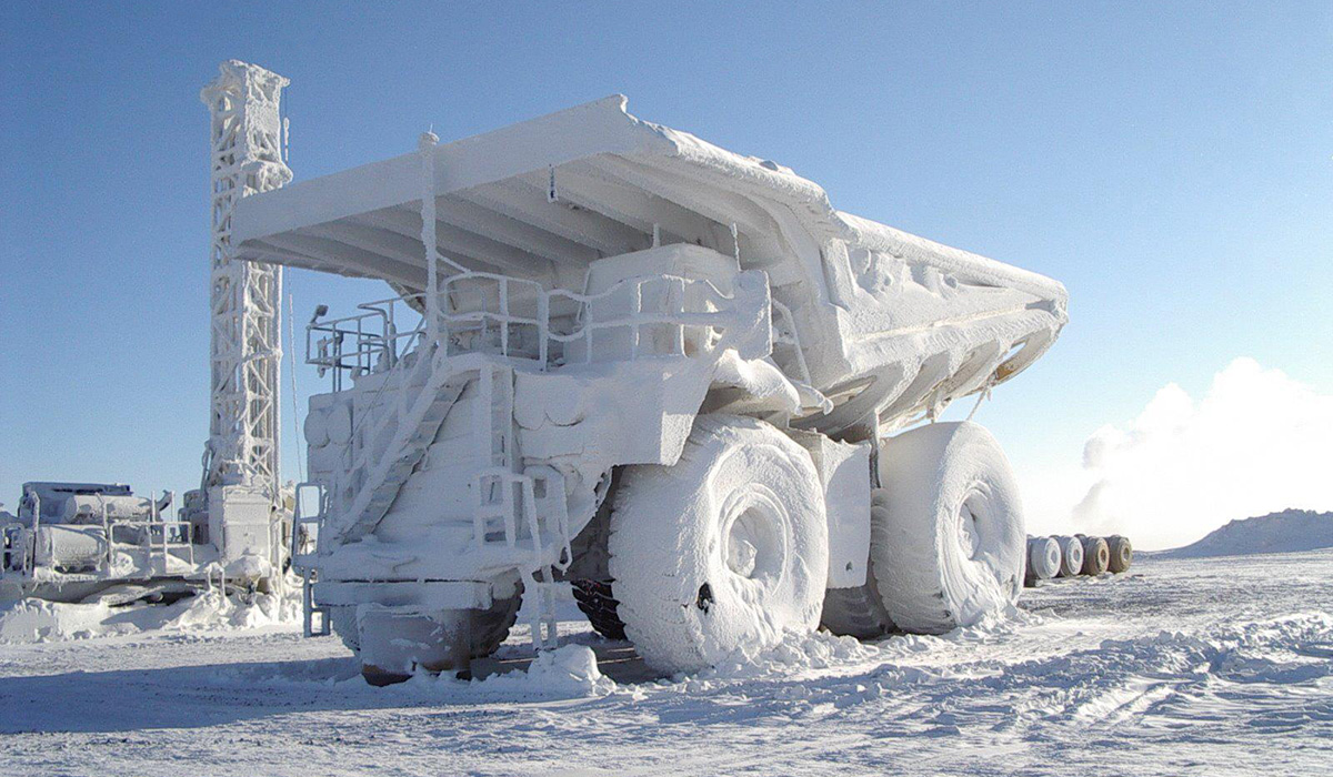 Hauler truck covered in snow